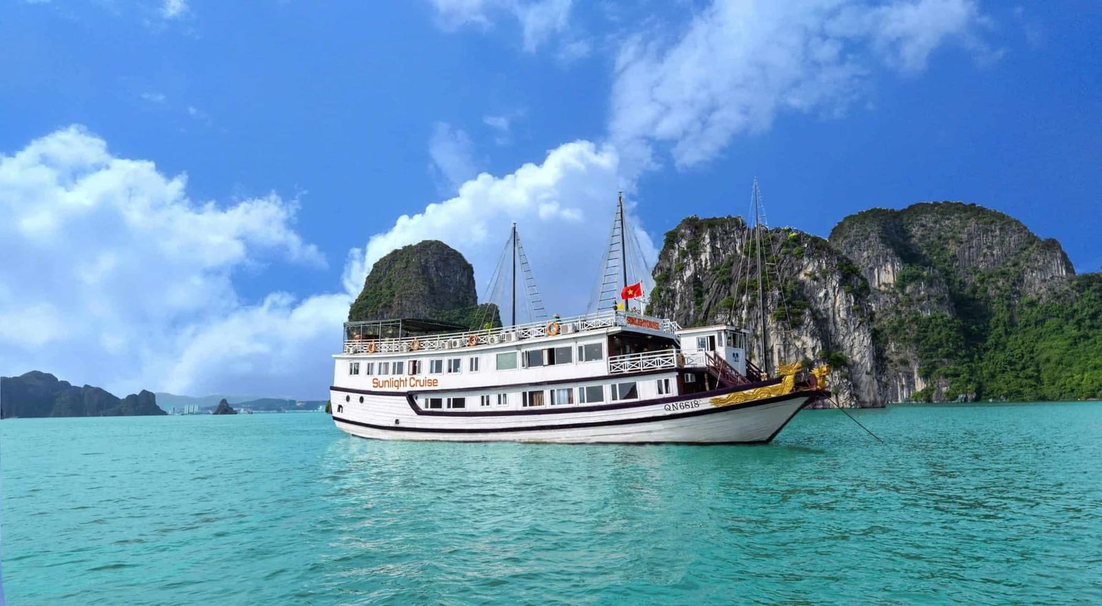 Overnight on a traditional junk boat among limestone islands