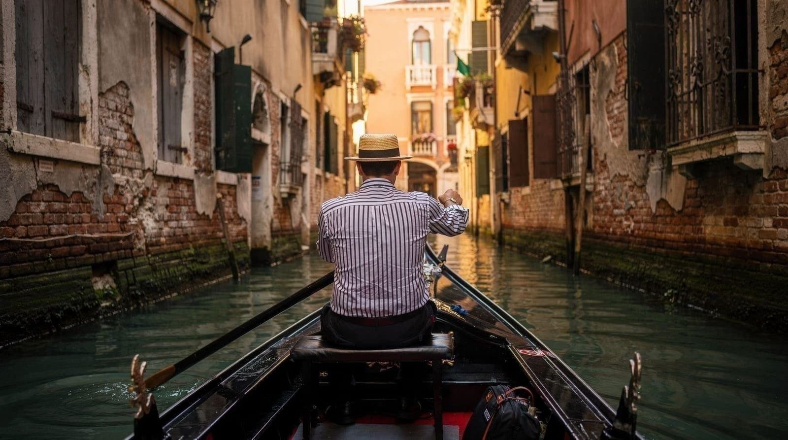 Take a private gondola through the quiet back canals