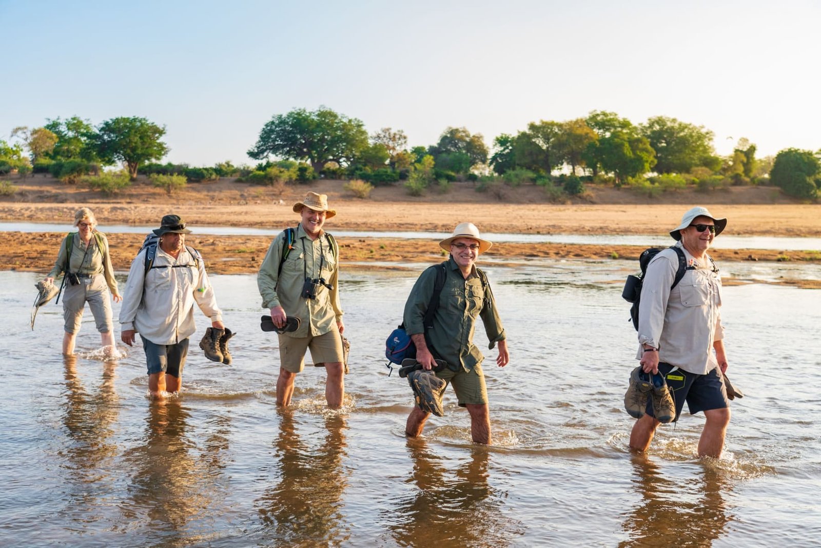 A small group gathered together on safari